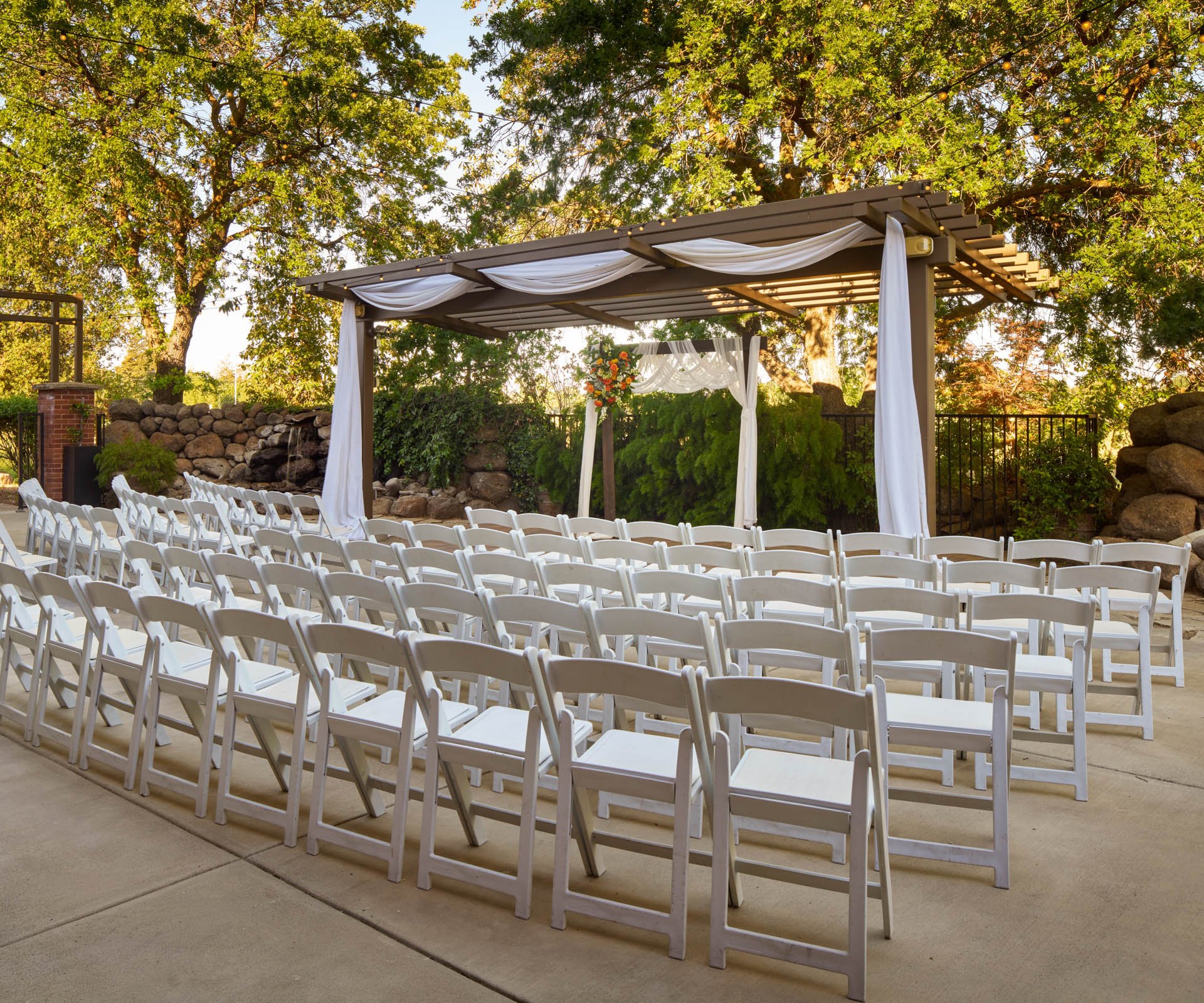 01 - Evergreen Springs - EVGN - Waterfall Arbor - Outdoor Ceremony
