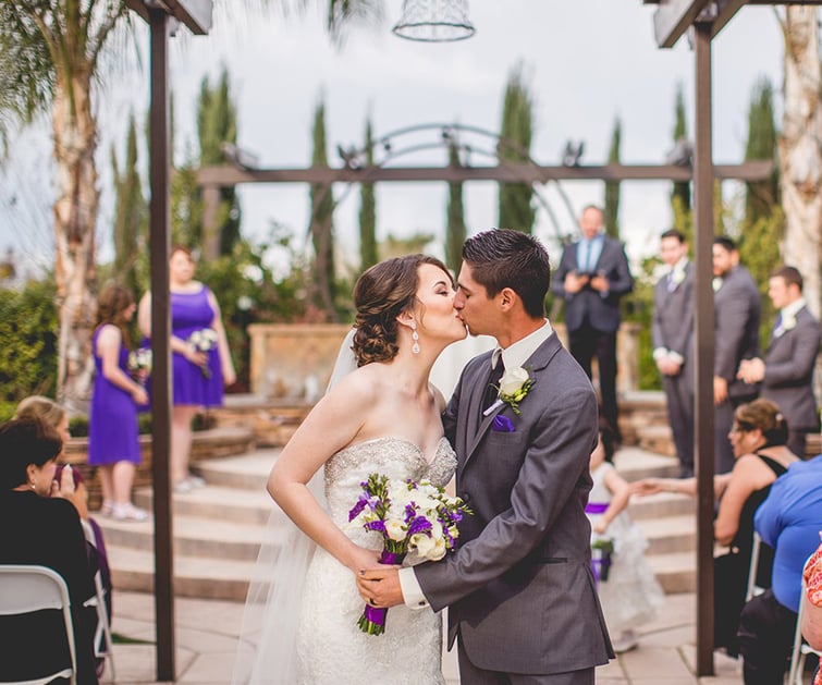 Wedding Ceremony Kiss | Fresno Fields by Wedgewood Weddings