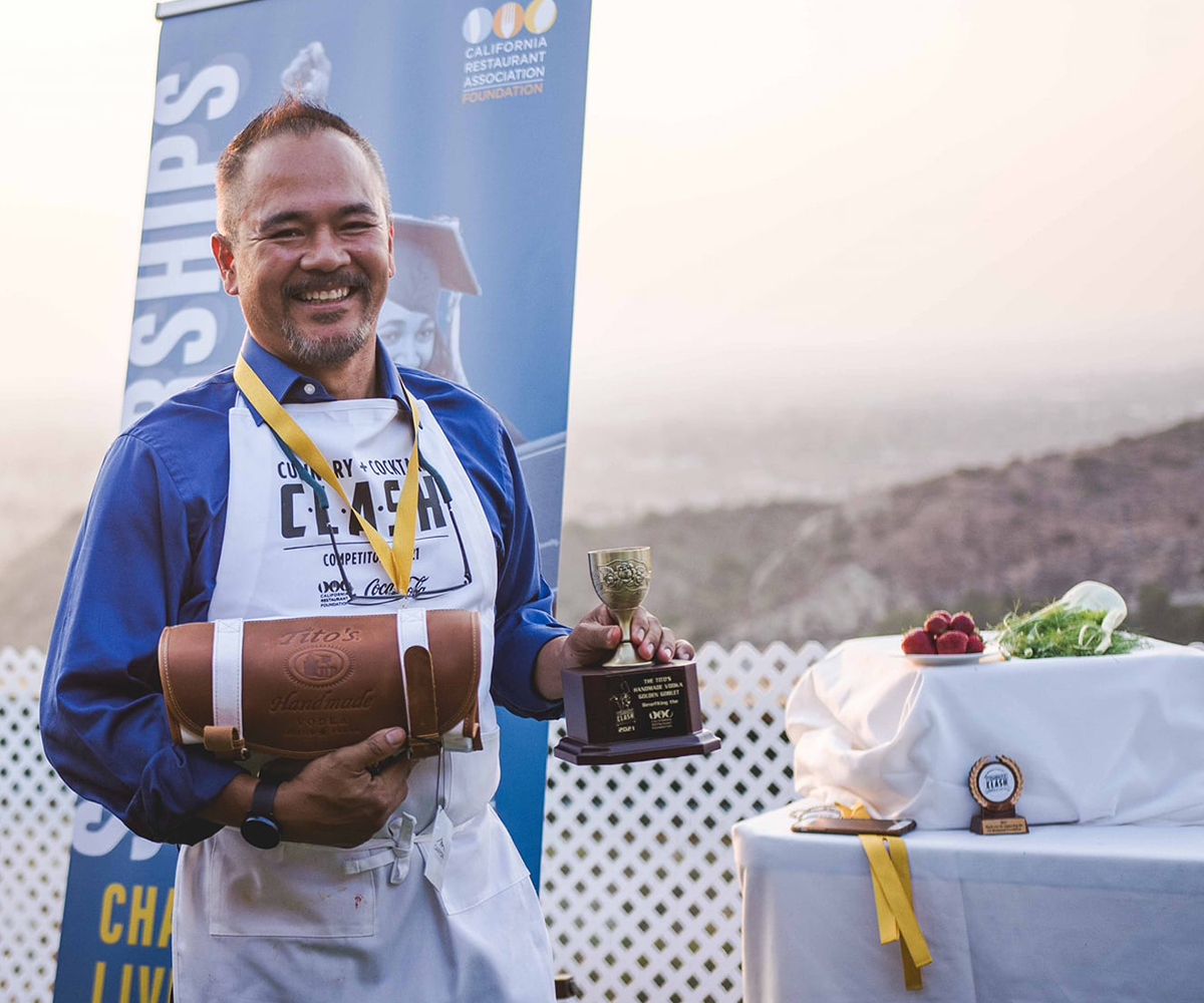 Bartender Bel with his Trophy for the Mexican Candy Cocktail