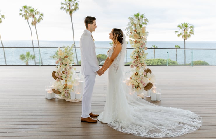 Bride and groom similing at altar - La Jolla Cove Rooftop by Wedgewood Weddings - 1