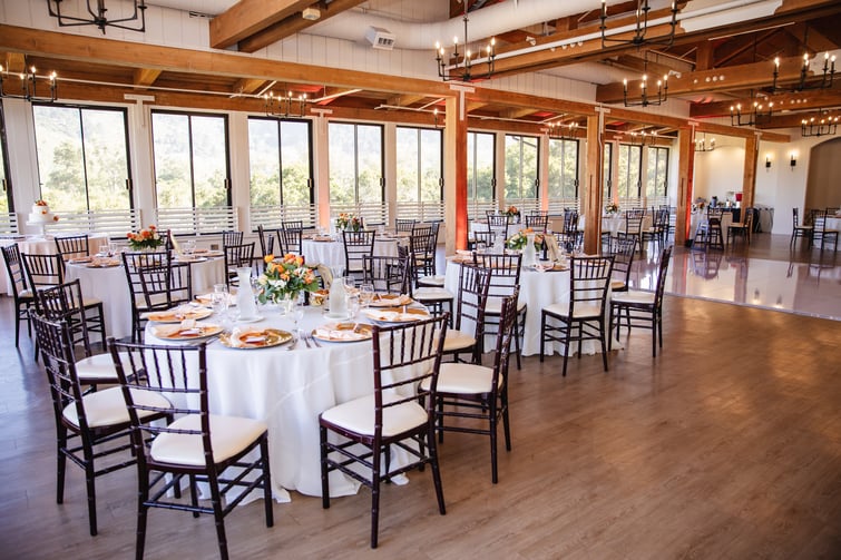 Elegant grand hall with colorful florals - Carmel Fields by Wedgewood Weddings