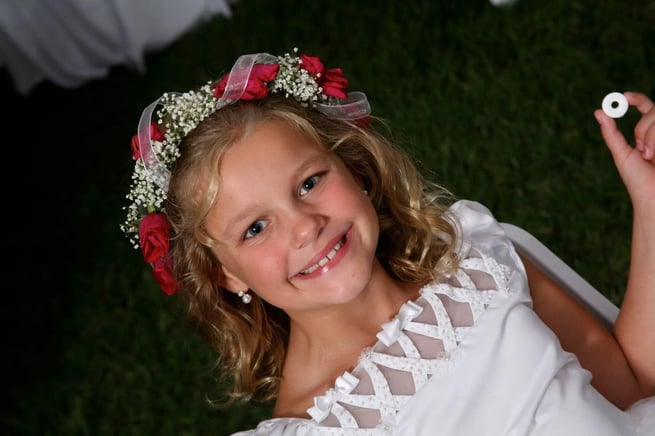 Team member Heidi as a flower girl