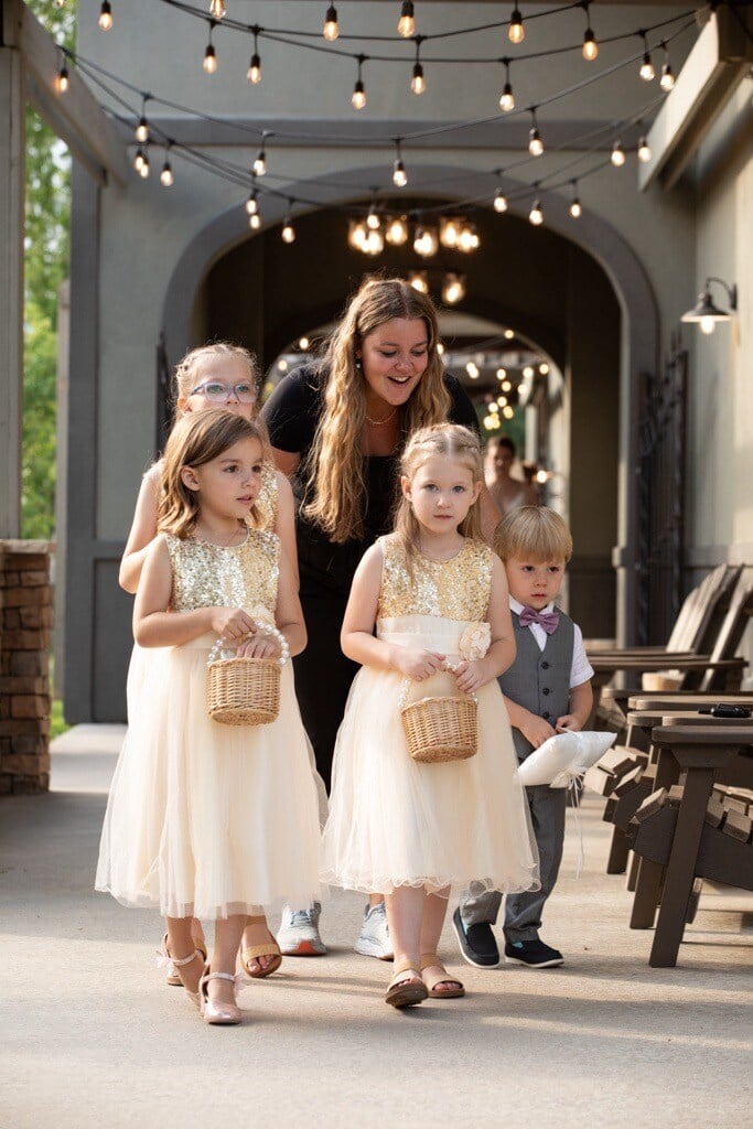 Team member and coordinator Heidi sending flower girls