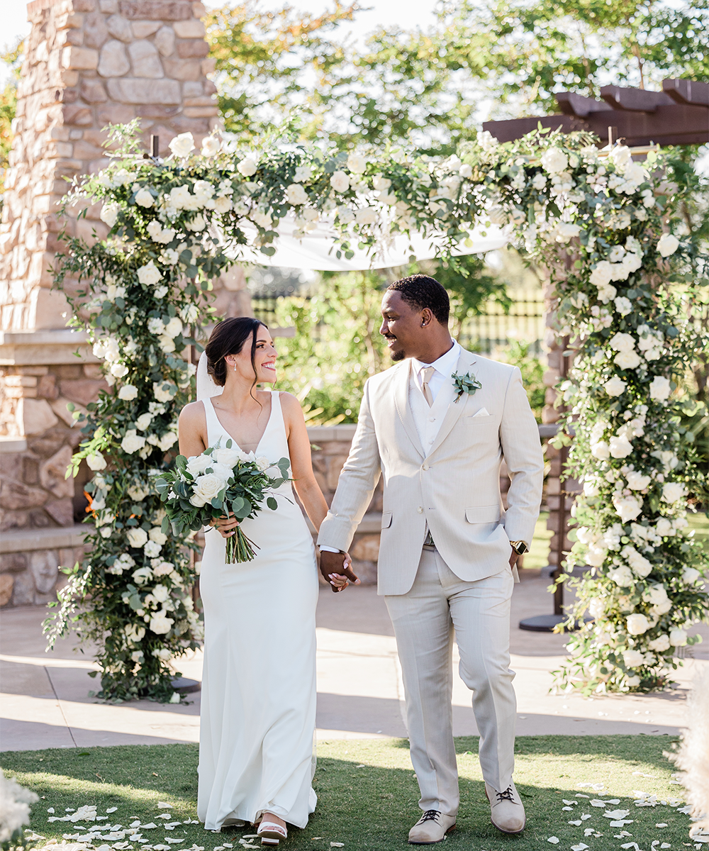 Couple at fireside ceremony with arch - Aliso Viejo by Wedgewood Weddings