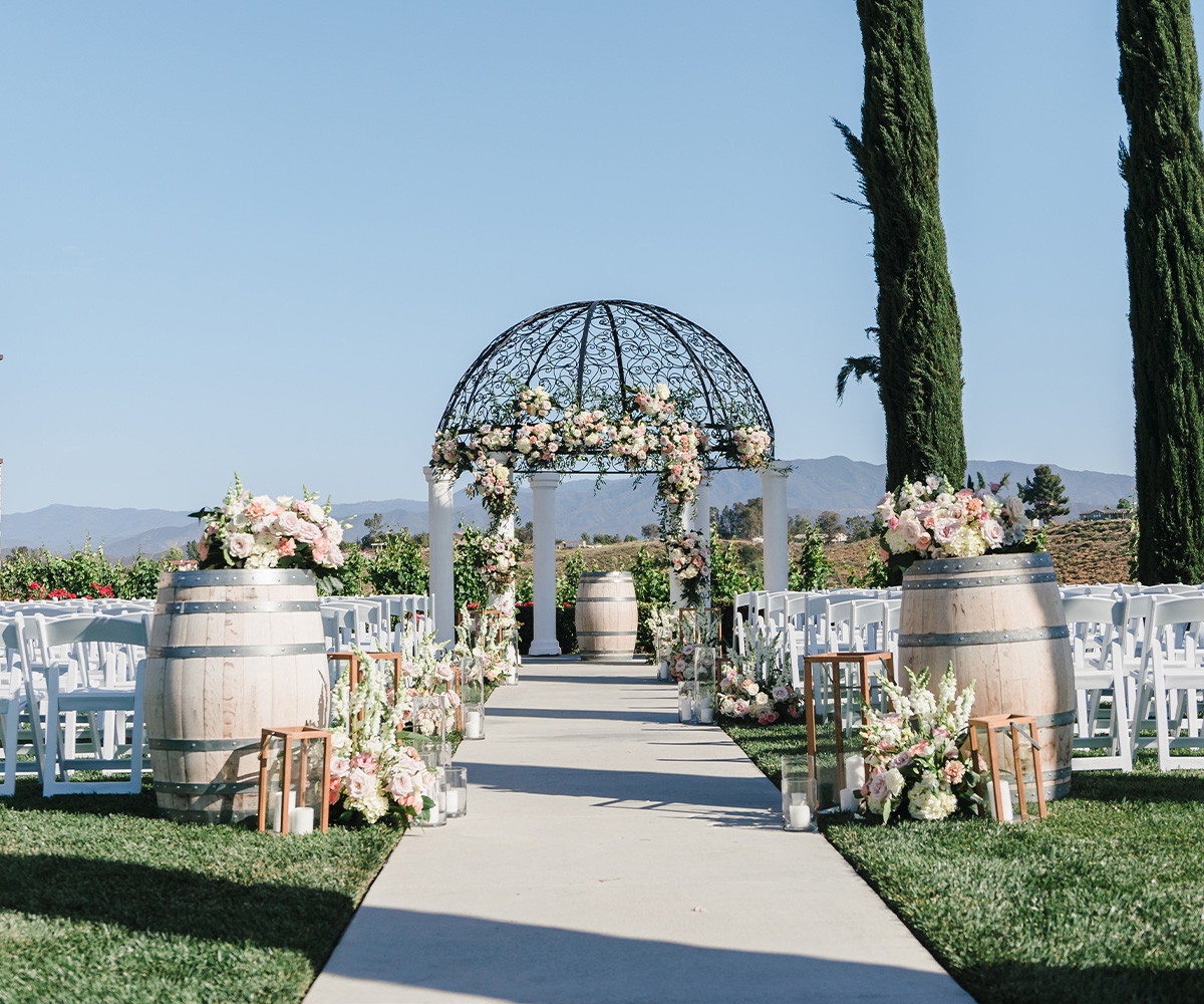 Vibrant floral decorating the ceremony lawn at Avensole Winer