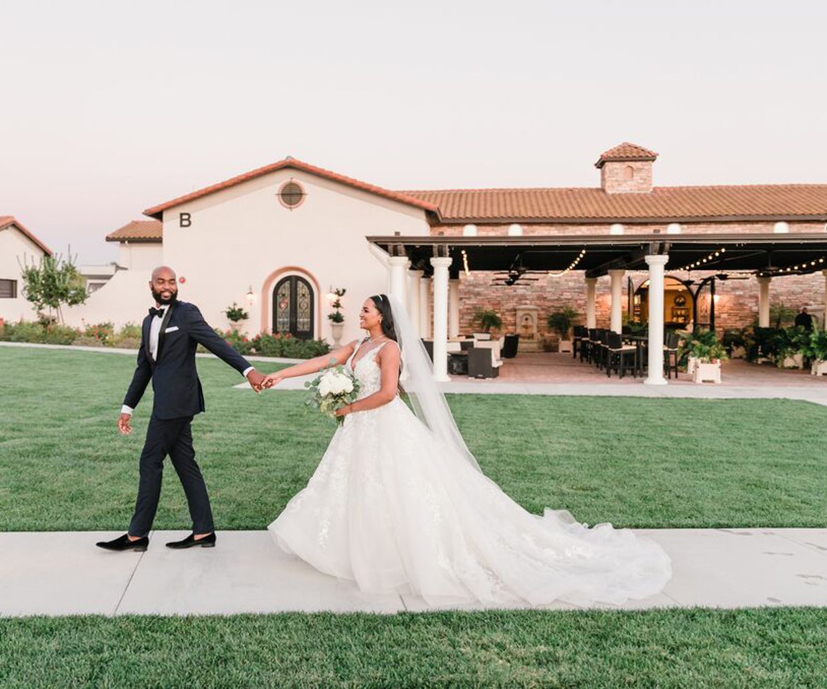Bride and groom sharing a moment near the outdoor patio of Avensole Winery