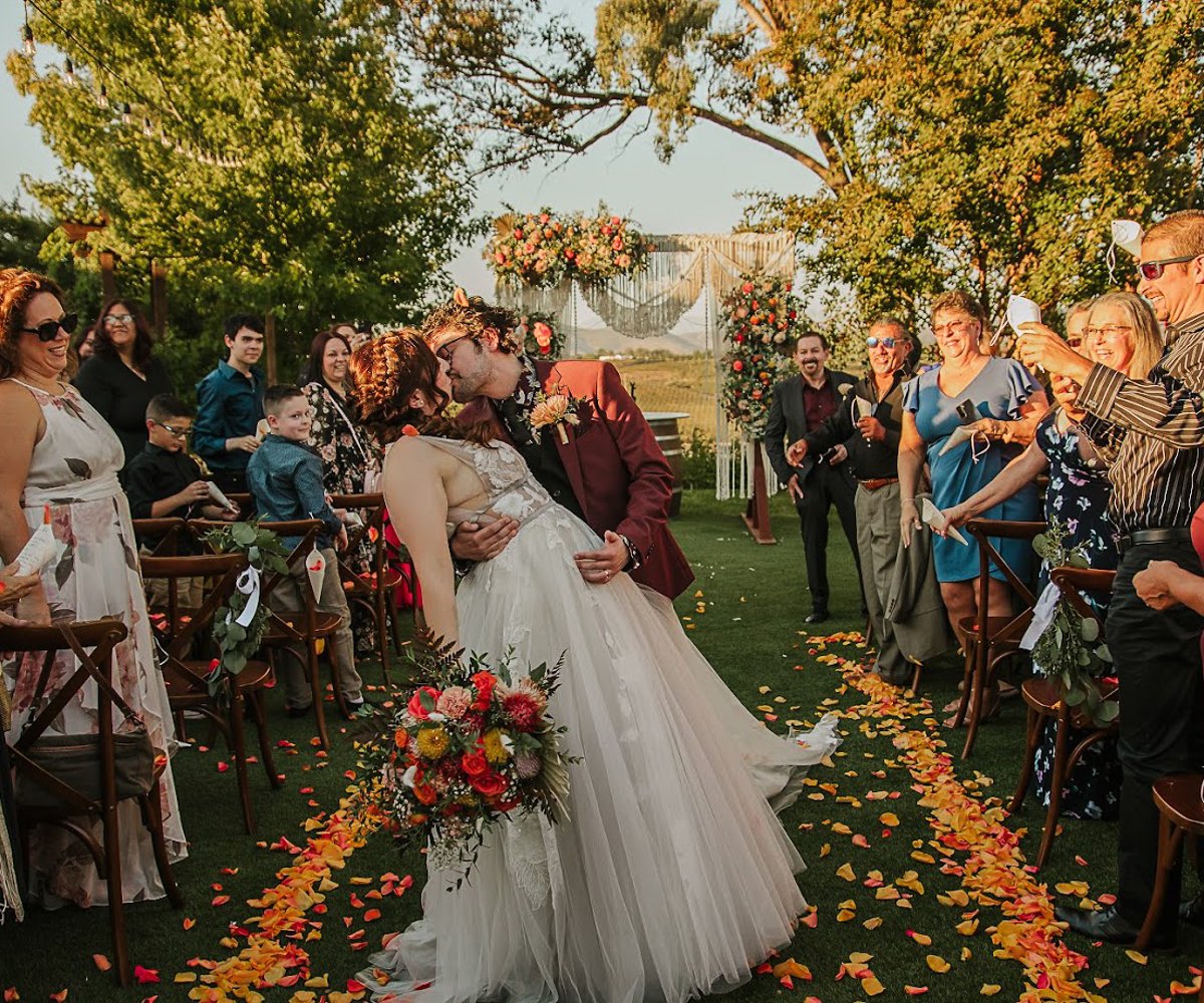 Boho fall, first kiss at Bel Vino Winery by Wedgewood Weddings