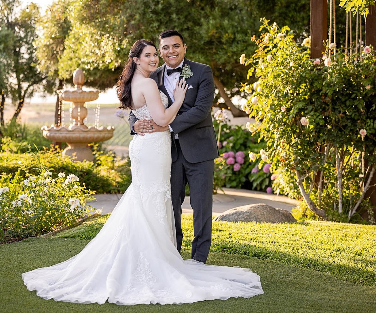 Couple by fountain - Bel Vino Winery by Wedgewood Weddings