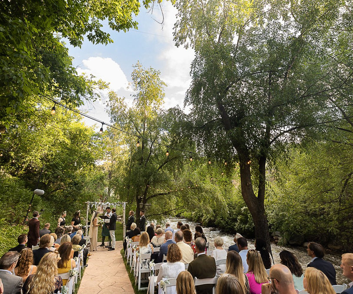 Serene Creekside Ceremony Setting at Boulder Creek with Natural Water Backdrop in Colorado
