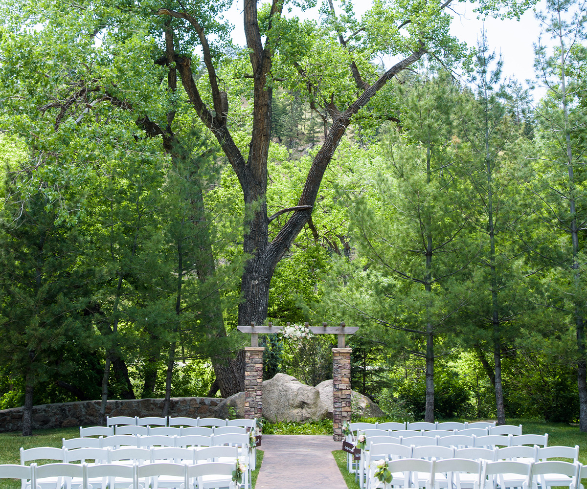 Lush Garden Ceremony Setup on the Top Lawn at Boulder Creek, Colorado, with Mountain Views