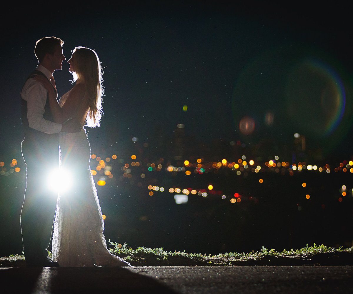 Night time shot with city skyline - Brittany Hill by Wedgewood Weddings