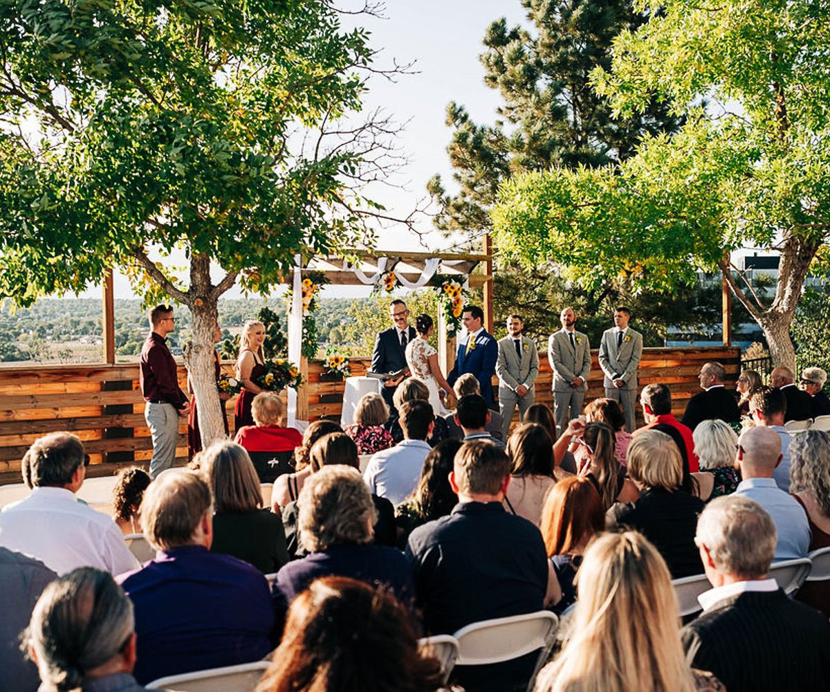 Outdoor ceremony with sunflowers -Brittany Hill by Wedgewood Weddings