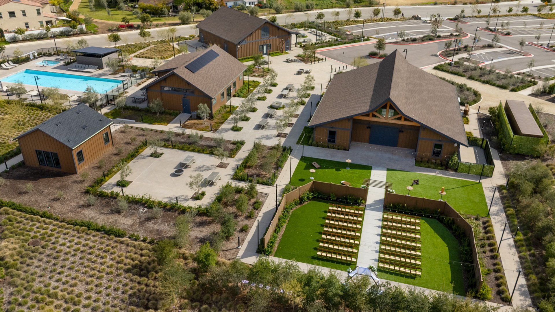 Overhead aerial image of Canopy Grove featuring the rustic barn, ceremony lawn, cocktail patio, and swimming pool in Escondido, CA.