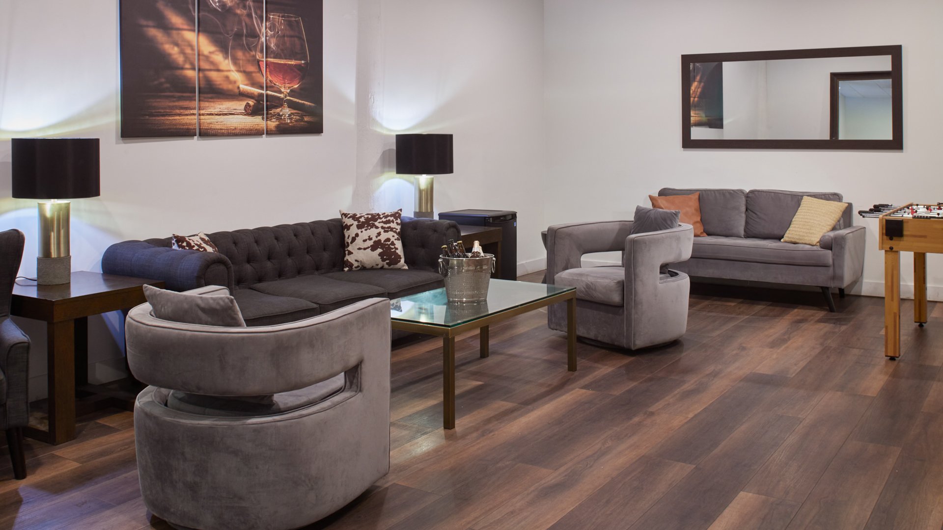 Carlsbad Windmill hospitality suite with plush seating, modern decor, and entertainment space for wedding parties.