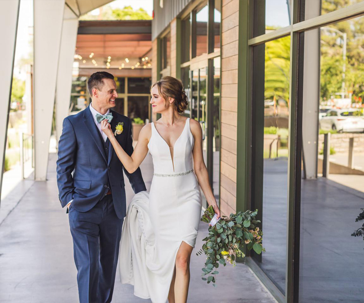 Couple walking down hallway at Clayton House by Wedgewood Weddings