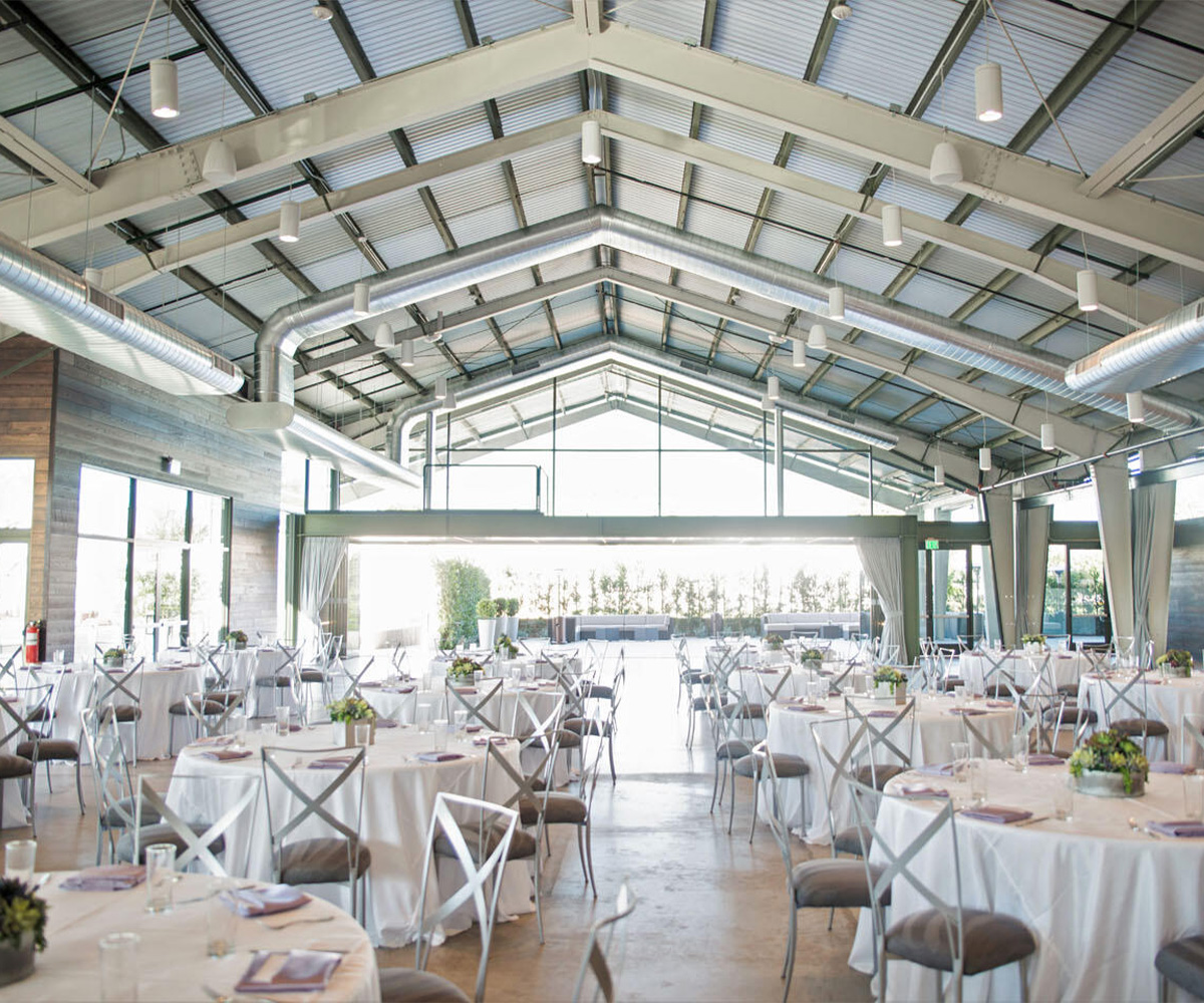 The Hangar reception looking out toward patio - Clayton House by Wedgewood Weddings