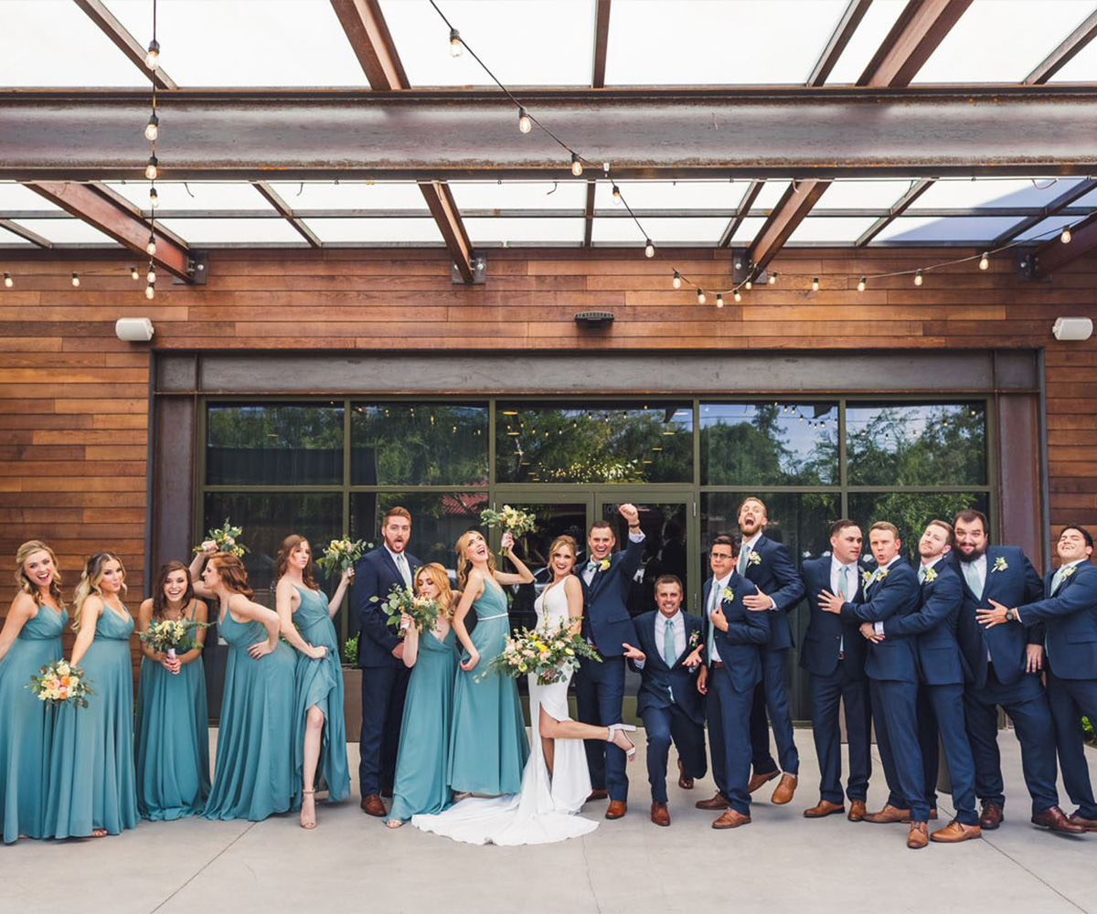 Wedding party outside Clayton House by Wedgewood Weddings