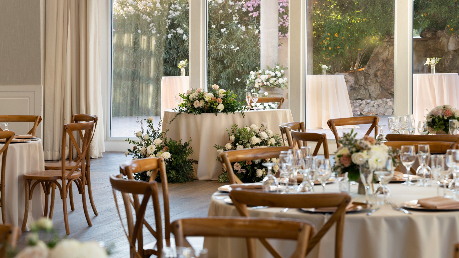 Indoor wedding reception at Colby Falls Arizona with decorated banquet tables, floral centerpieces, and wood-accented interiors.