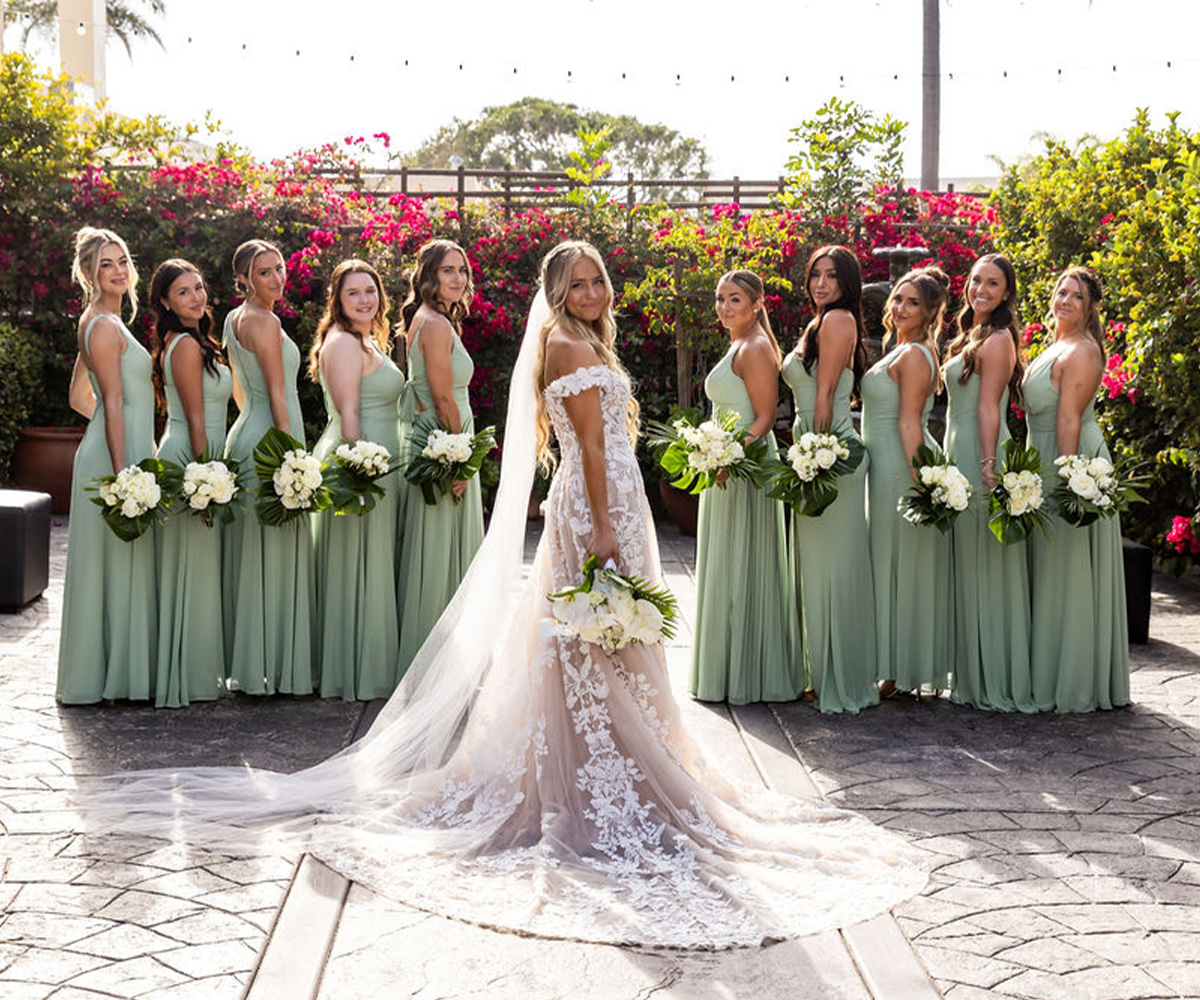 Bridal party in front of flowers - Cuvier Club by Wedgewood Weddings
