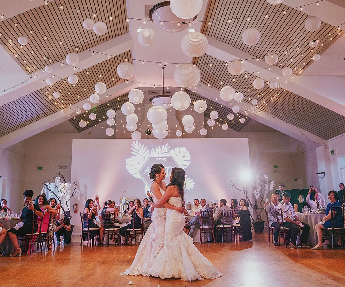 Two-Brides-enjoying-their-first-dance-at-Cuvier-Club
