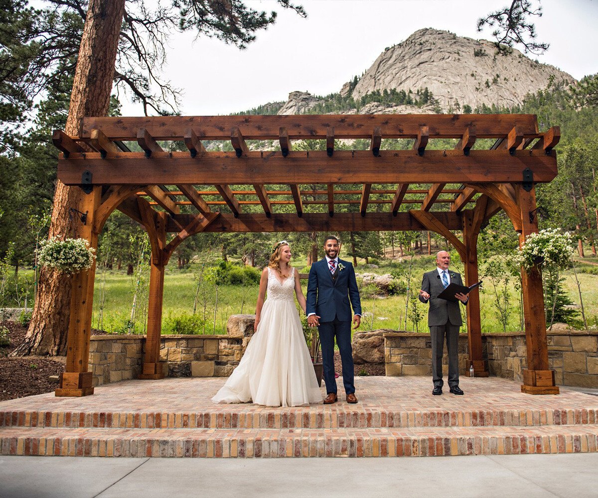 Happy couple at ceremony site - Della Terra by Wedgewood Weddings