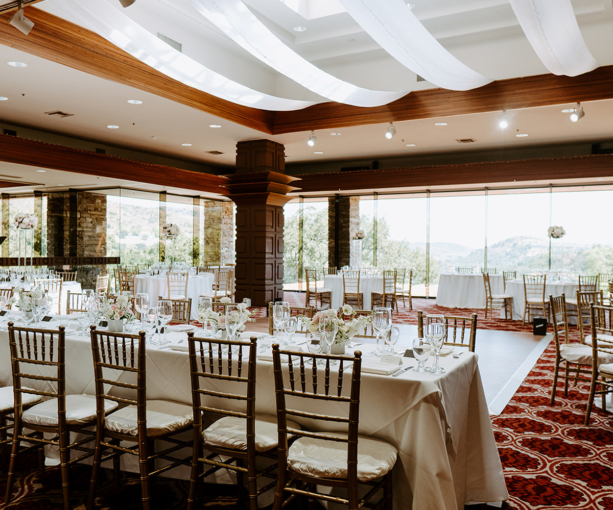 Indoor reception hall at Dove Canyon with large window and high ceilings (5)