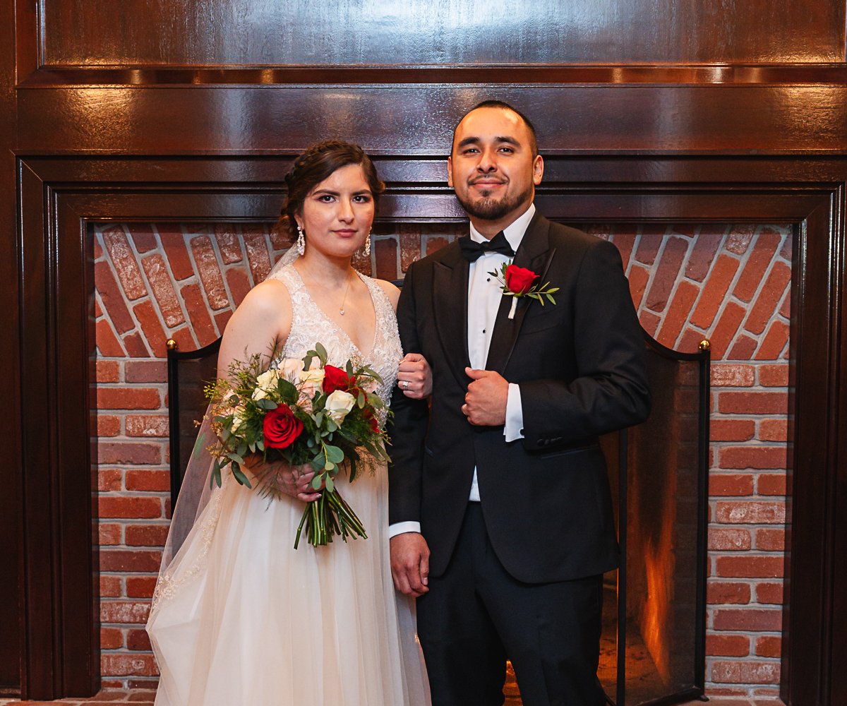 Couple inside by fireplace - Eagle Ridge by Wedgewood Weddings