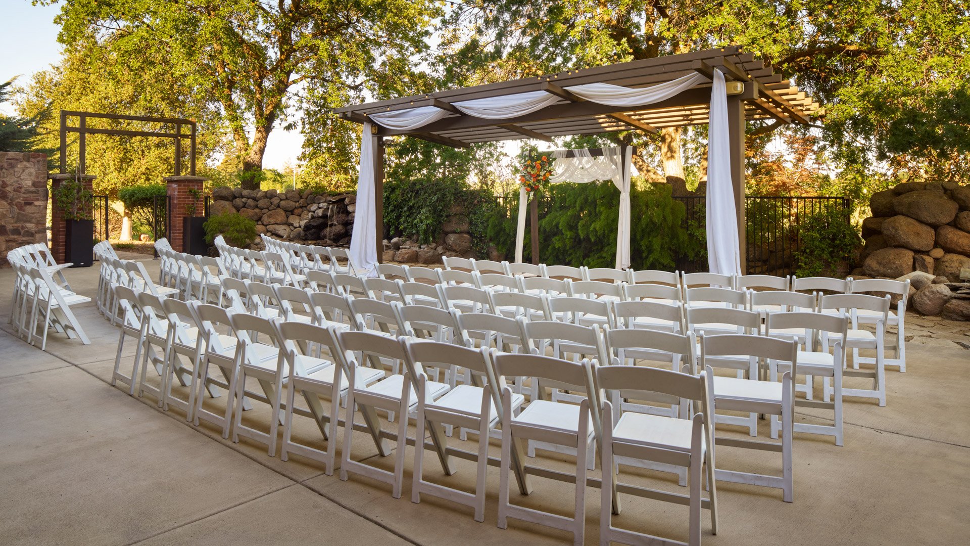01 - Evergreen Springs - EVGN - Waterfall Arbor - Outdoor Ceremony