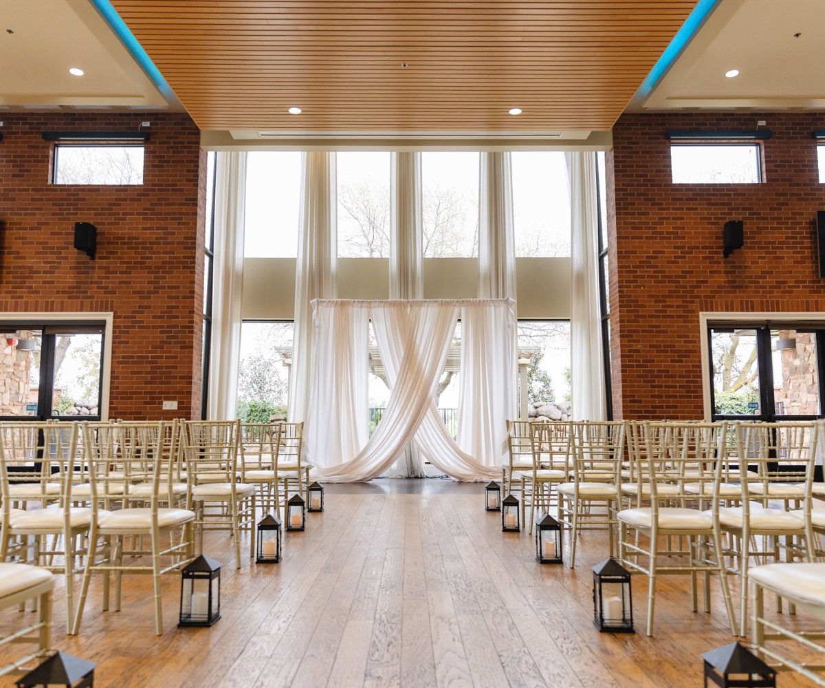 Indoor ceremony site with aisle lanterns - Evergreen Springs by Wedgewood Weddings - 2