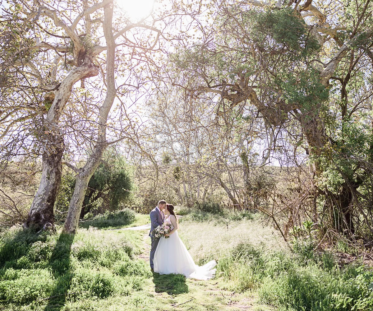 Couple in treeswoods - Fallbrook Estate by Wedgewood Weddings