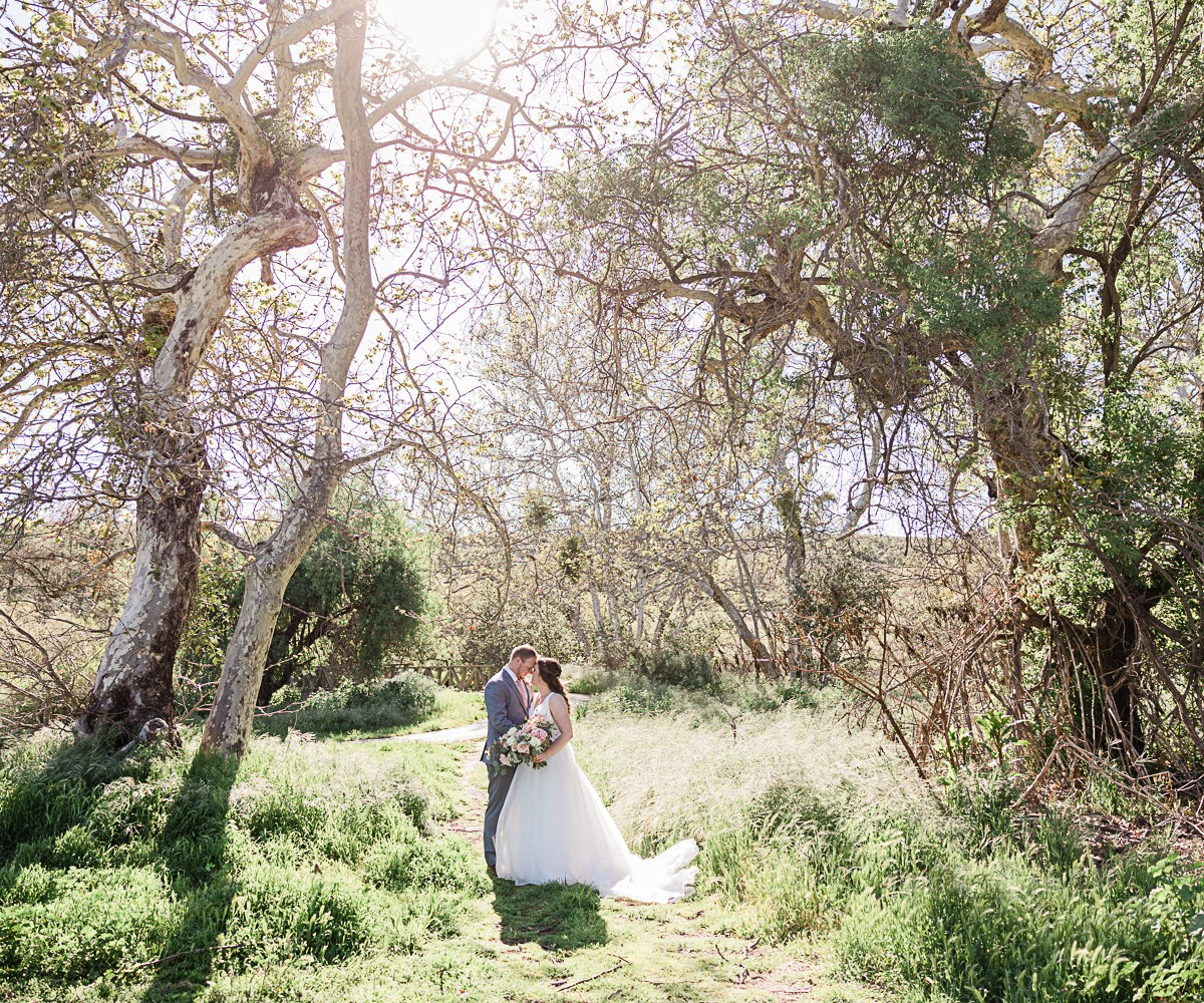 Couple in treeswoods - Fallbrook Estate by Wedgewood Weddings