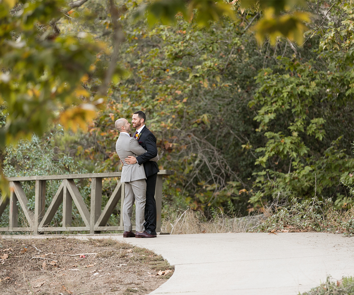 couple on bridge at Fallbrook Estate by Wedgewood Weddings