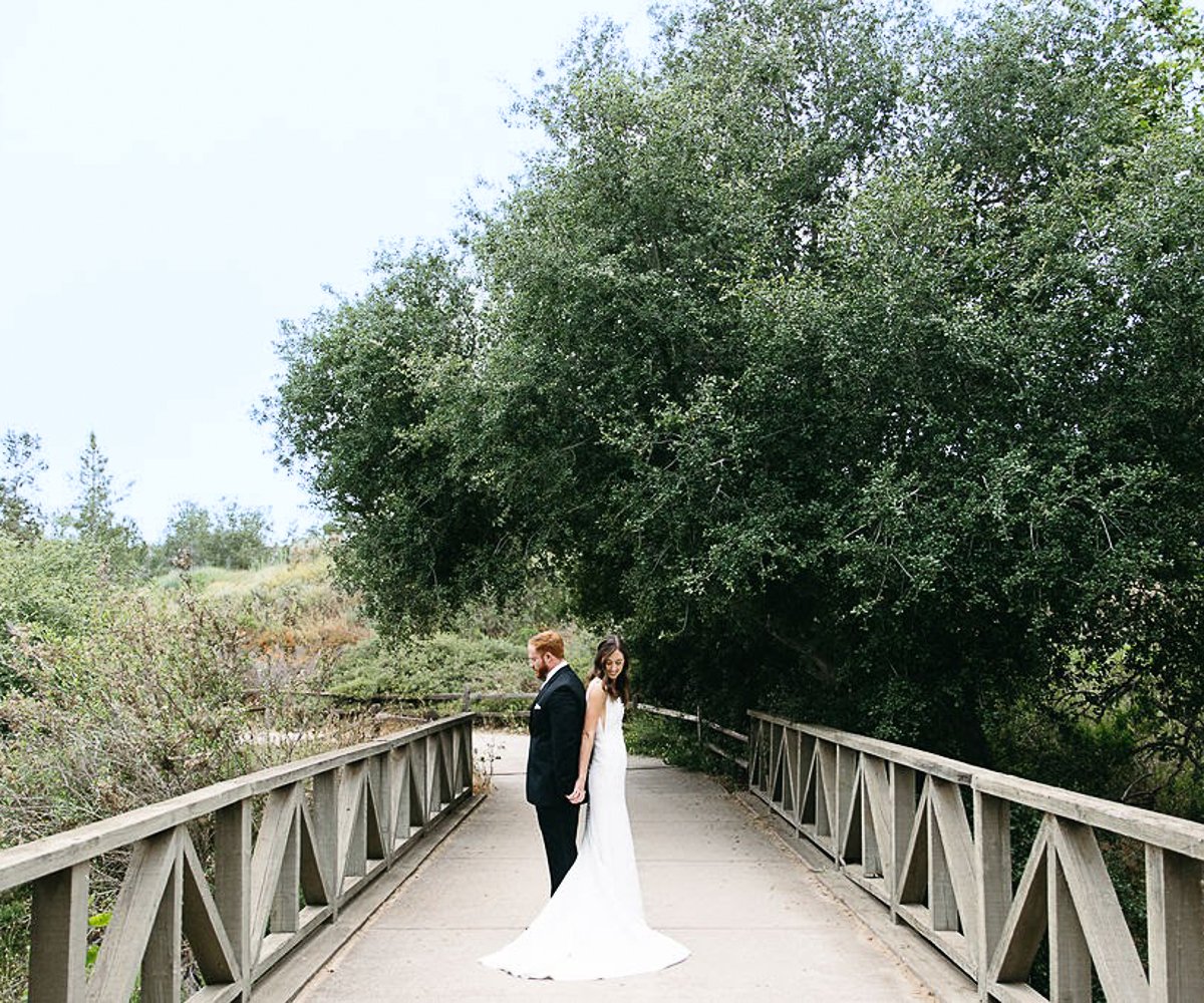 Photo op - couple on bridge at Fallbrook Estate by Wedgewood Weddings