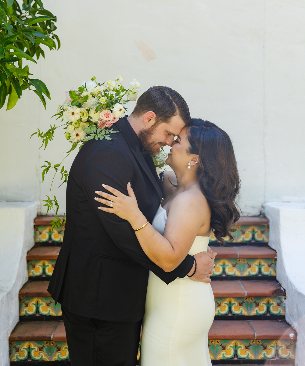 Couple in front of tile stairs - Hacienda de las Flores by Wedgewood Weddings