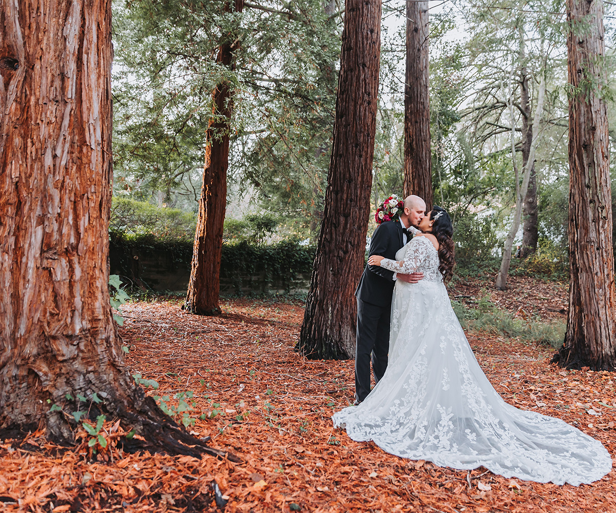Couple kissing by tree - Hacienda de las Flores by Wedgewood Weddings