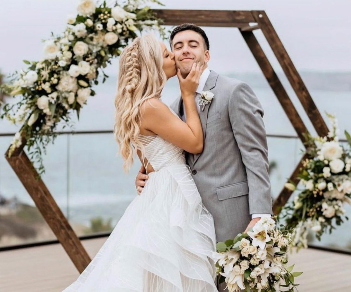 Bride kissing groom on the cheek - La Jolla Cove Rooftop by Wedgewood Weddings - 1