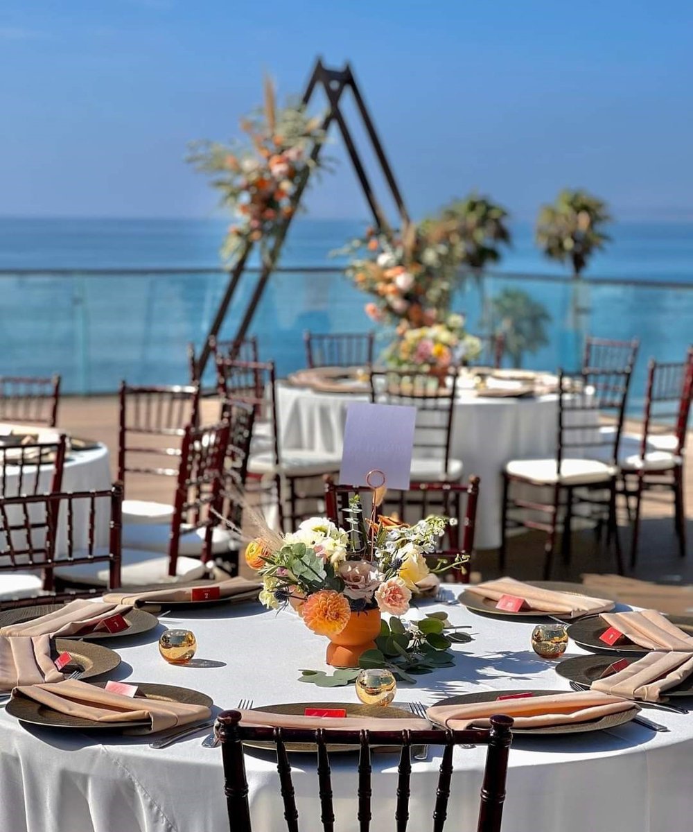 Tablescape set up for wedding reception with orange flowers -  by Wedgewood Weddings - 1