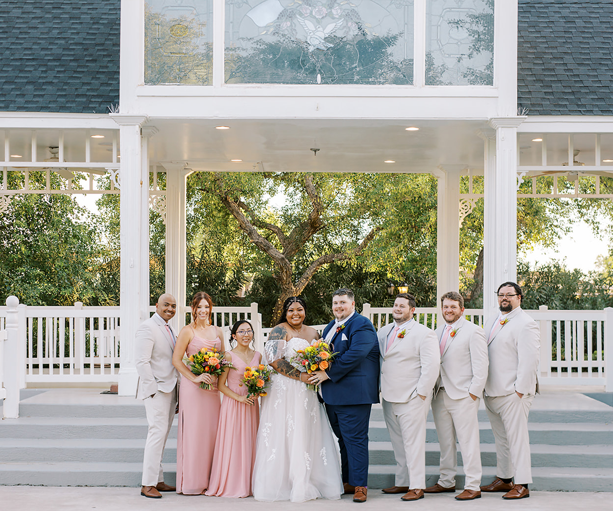 Wedding party in front of pergola at Lindsay Grove by Wedgewood Weddings