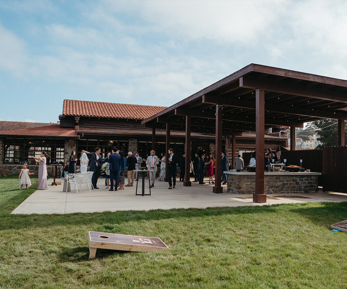 Cocktail hour with lawn games - Log Cabin by Wedgewood Weddings