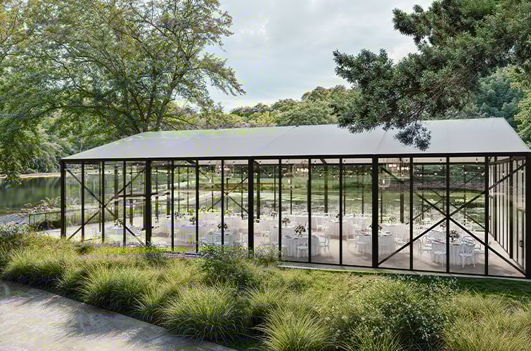 Glass Pavillion with views of the lake and woodland