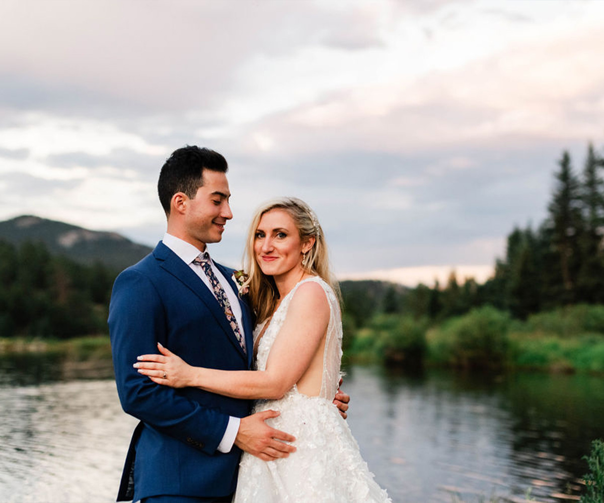 Couple in front of pond at Mountain View Ranch by Wedgewood Weddings