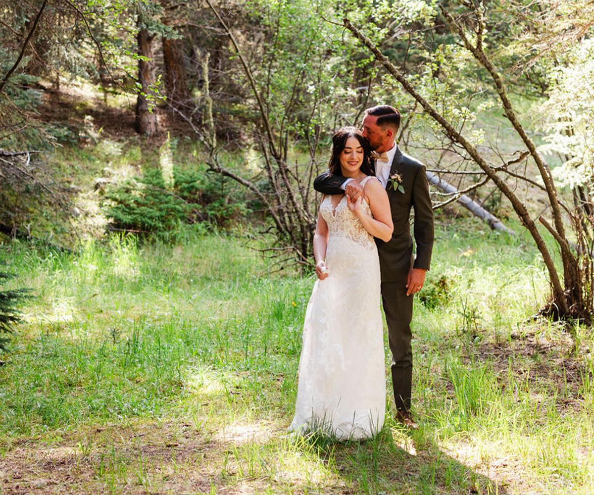 Couple in woods - Mountain View Ranch by Wedgewood Weddings