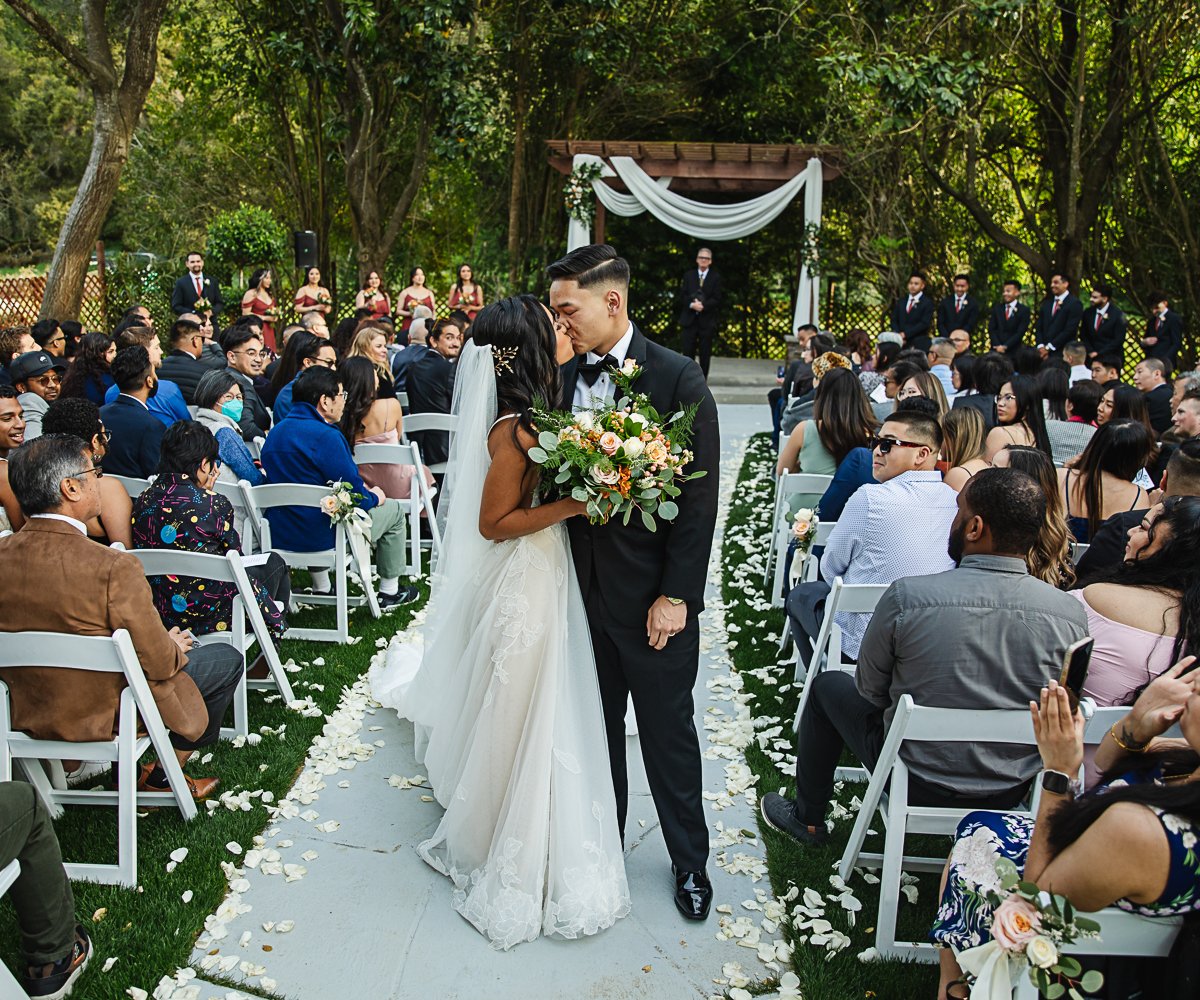 First kiss at ceremony - Redwood Canyon by Wedgewood Weddings