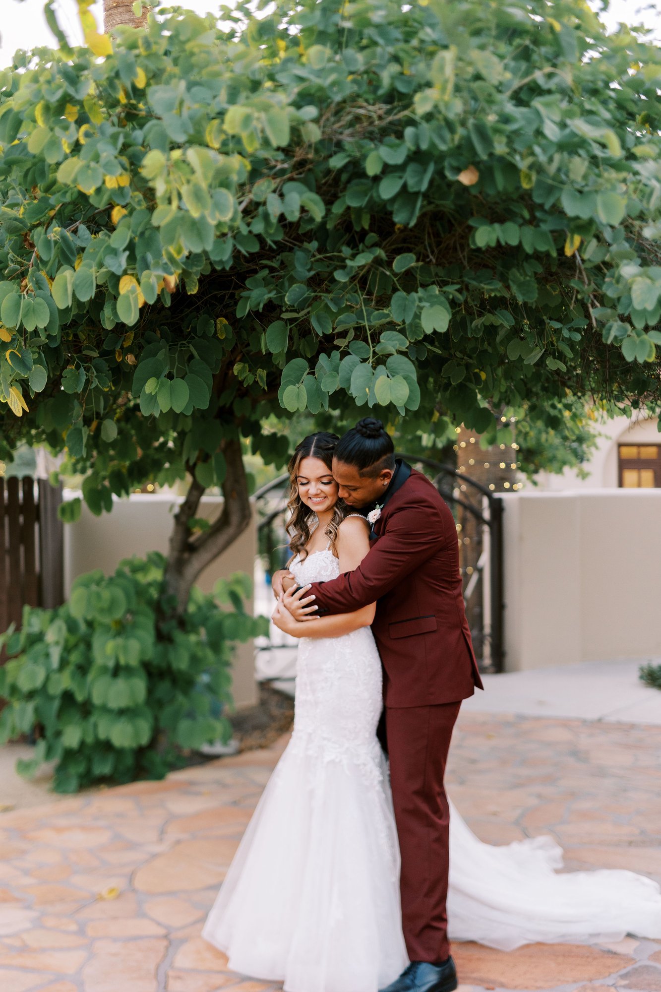 Couple in front of trees and greenery - Secret Garden