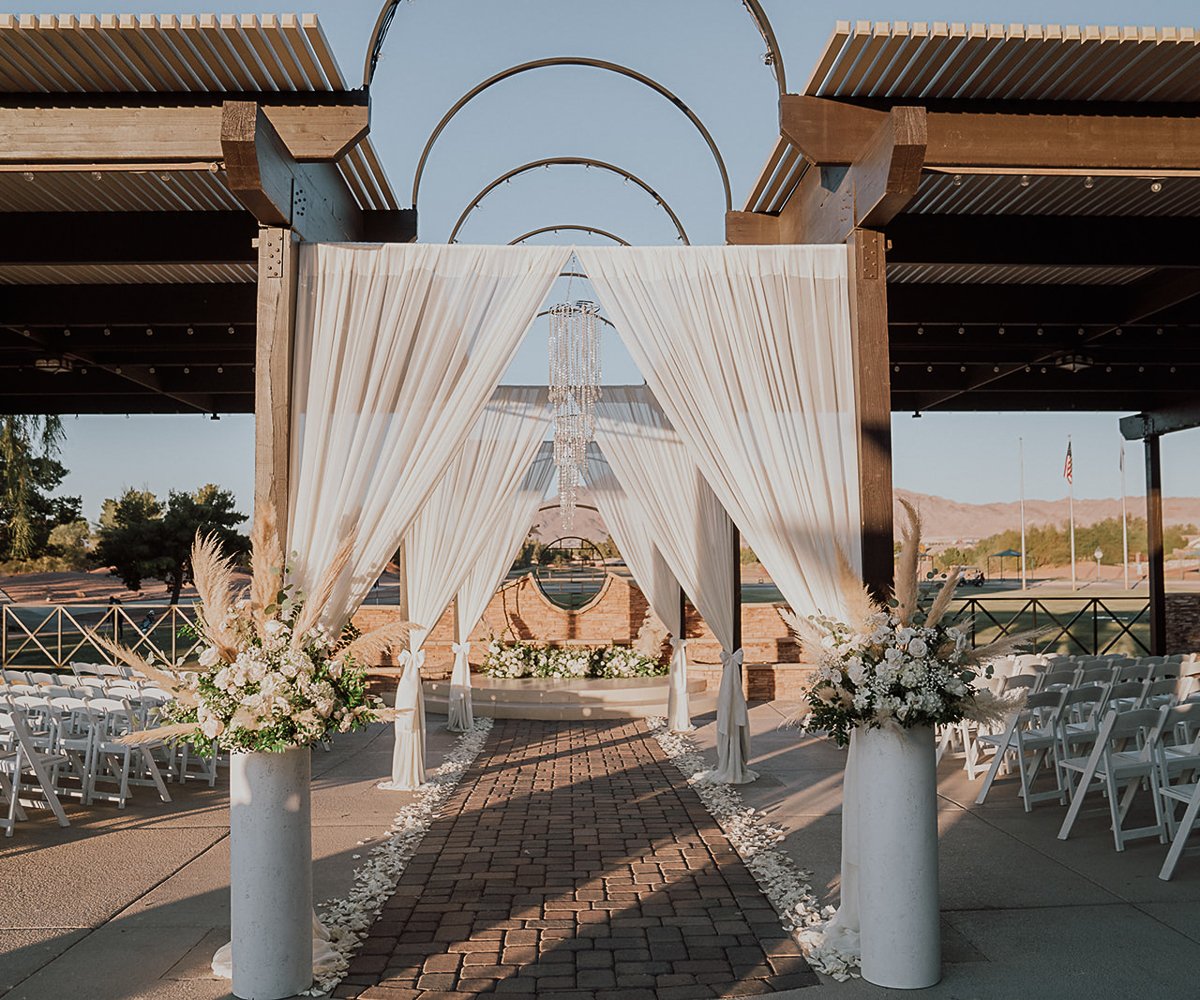 boho pampas grass at patio ceremony - Stallion Mountain by Wedgewood Weddings