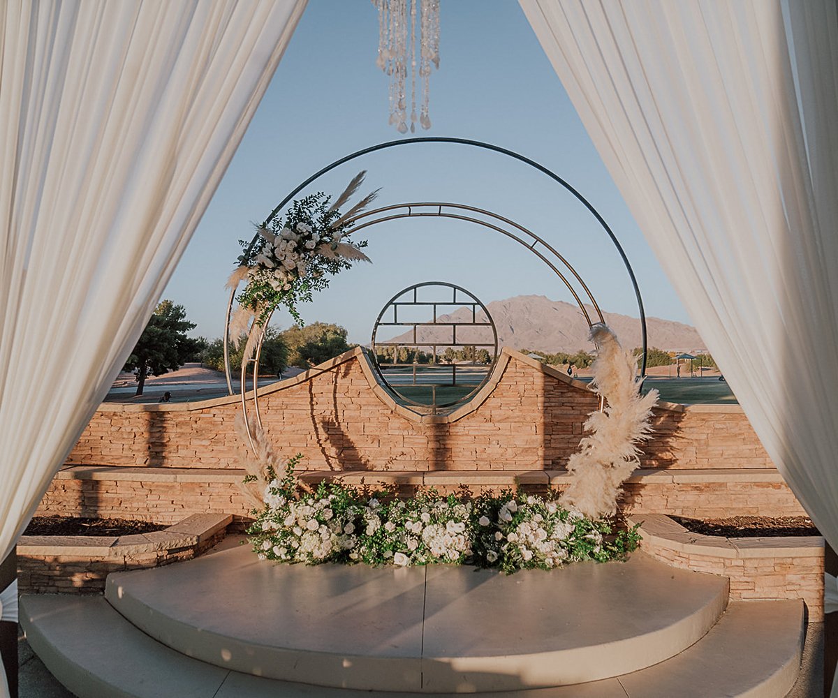 patio ceremony arch with pampas grass - Stallion Mountain by Wedgewood Weddings