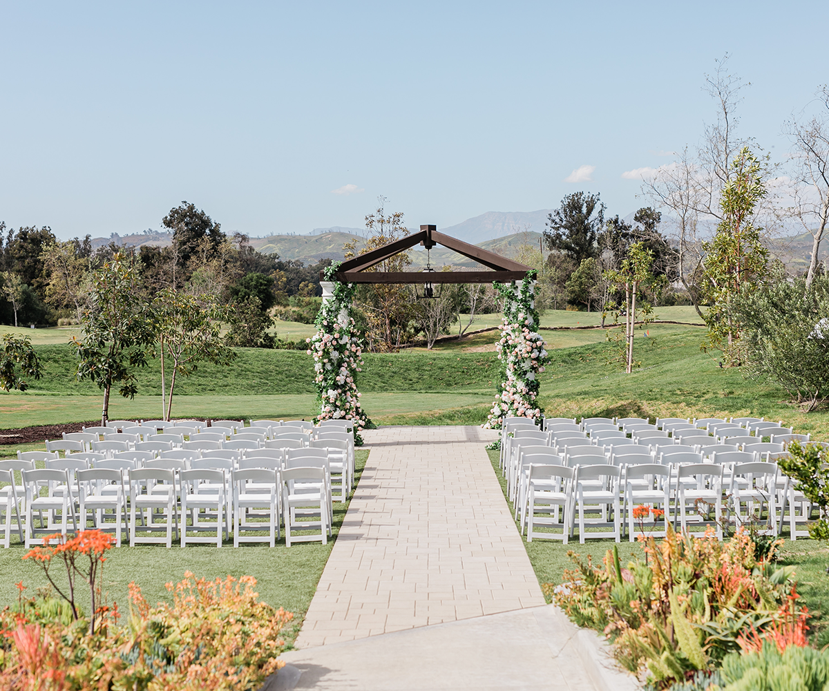 Outdoor garden ceremony with greenery at Sterling Hills