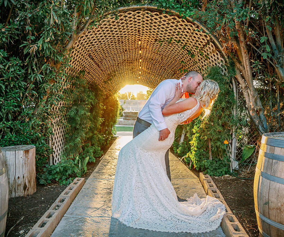 Couple by tunnel at The Orchard by Wedgewood Wedding