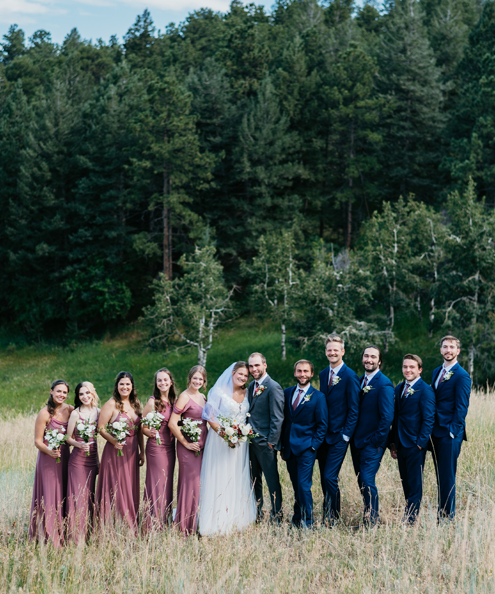 Wedding party in meadow with trees-  The Pines by Wedgewood Weddings