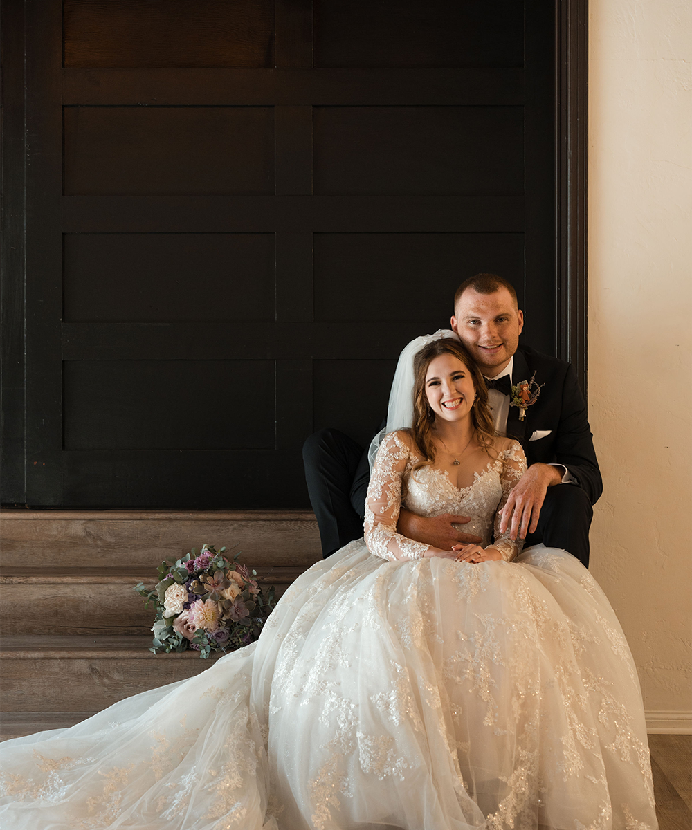 Couple in front of doors - The Sanctuary by Wedgewood Weddings